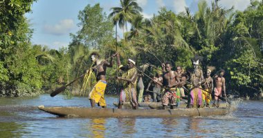 Canoe war ceremony of Asmat people clipart