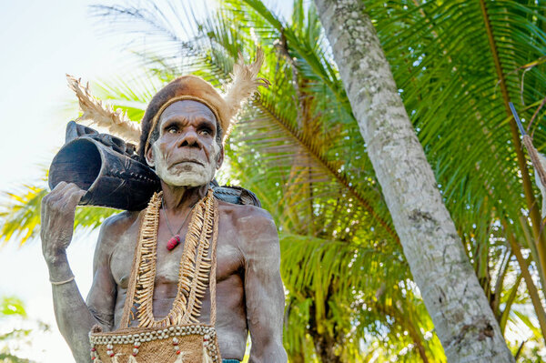 Leader of Asmat tribe with drum
