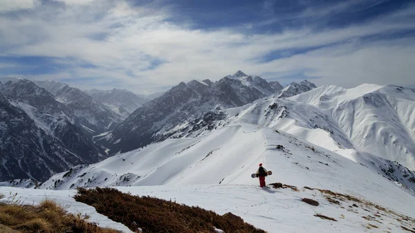 Snowboarder backcountry escalada —  Fotos de Stock