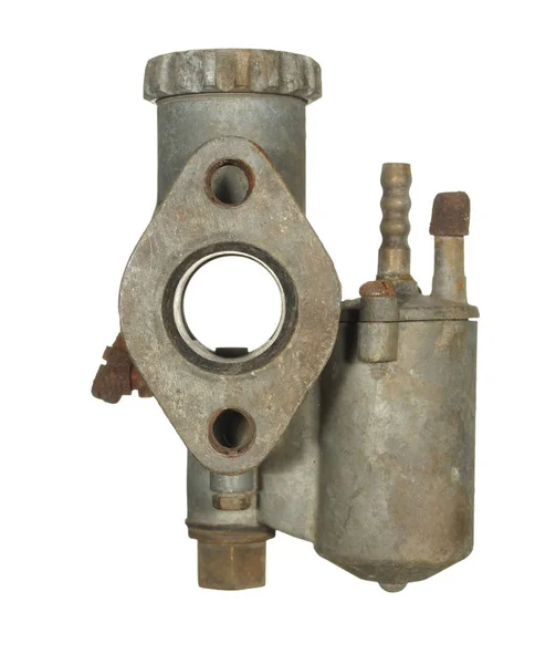 Old aluminum carburetor from an old motorcycle isolated on a whi — Stock Photo, Image