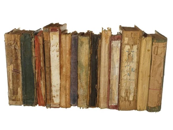 Mycket gamla och slitna böcker isolerad på vit bakgrund. — Stockfoto