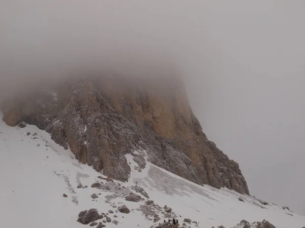 Fog in the mountains. Morning fog covers the rocks in the Italia