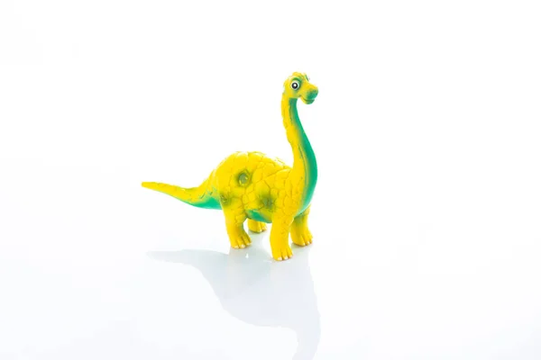 Brinquedo de dinossauro isolado em branco — Fotografia de Stock