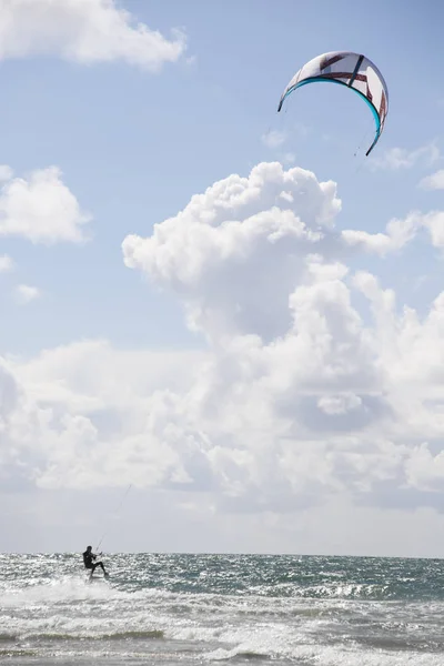 Extreme kite surfer on fast ride — Stock Photo, Image