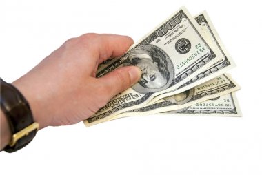 bir adamın elini yüzlerce dolar uzanır