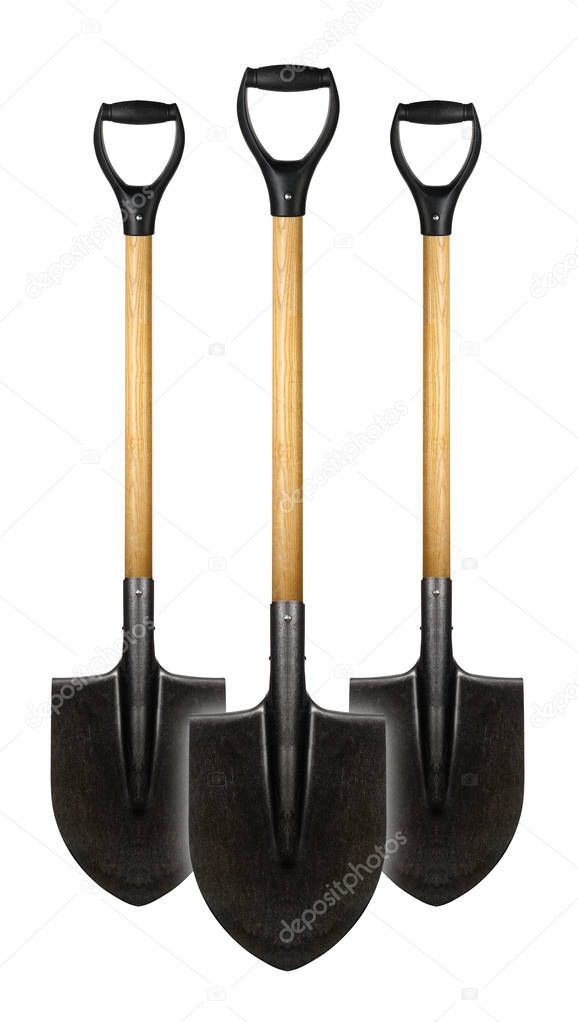 Three vertically standing shovels
