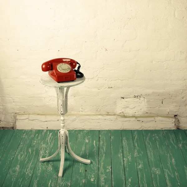 Retro style - Red vintage phone old flowers stand — Stock Photo, Image