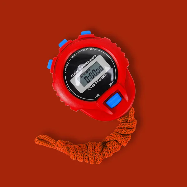 Sports equipment - Red Stopwatch red background — Stock Photo, Image