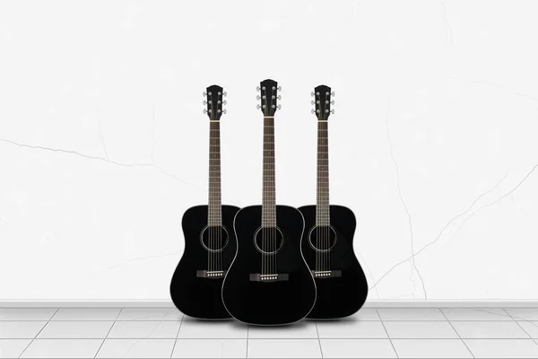 Home interior - Tre chitarre nere davanti al muro bianco — Foto Stock