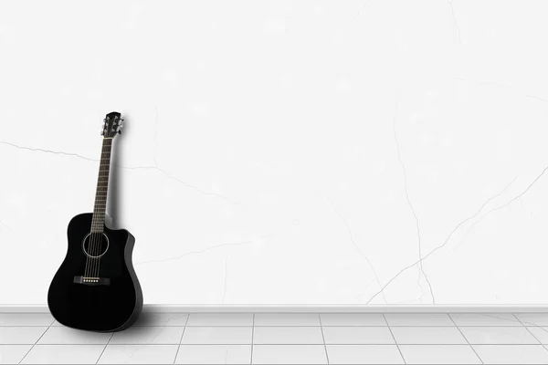 Domácí interiér - černá kytara před bílou zdí — Stock fotografie