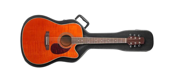 Musikinstrument - Orange gitarr från ovan på en hård väska — Stockfoto