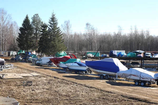 Winter boats parking - Many boats on a trailers