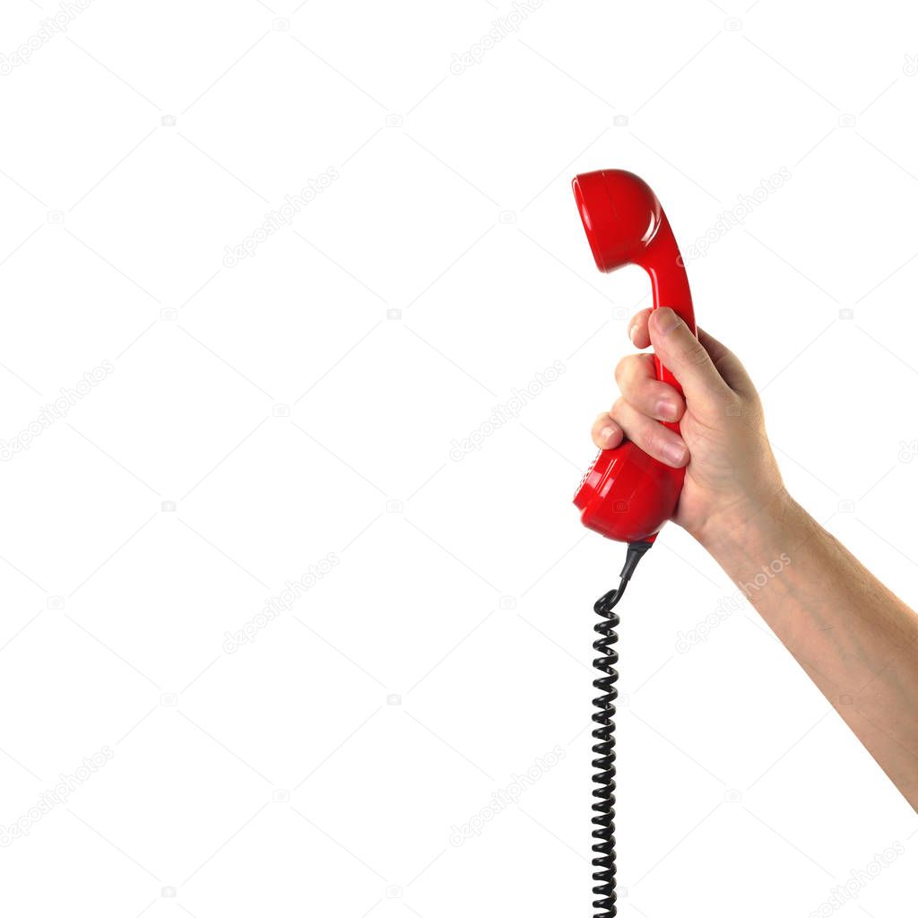 Objects Hands action - Hand holds retro phone red handset. Isola