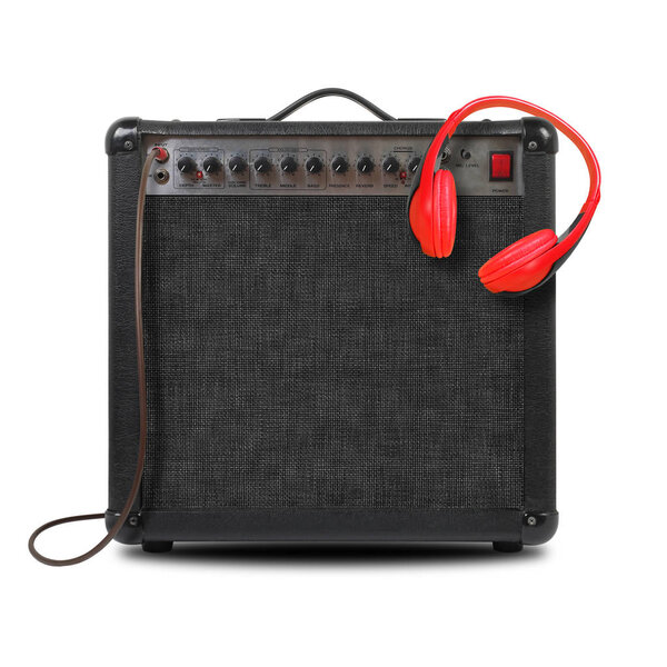 Music and sound - Musical instrument Guitar amplifier, headphone and cable front view isolated on a white background.