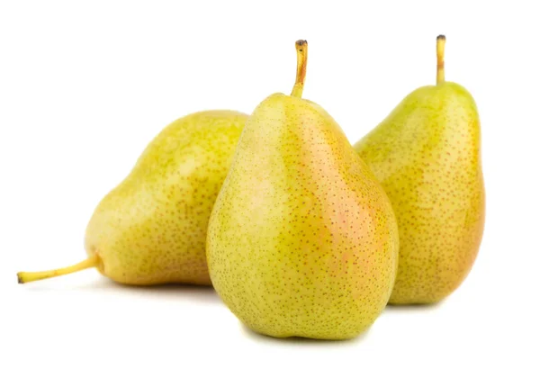 Three ripe yellow pears Royalty Free Stock Photos