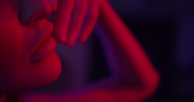 Fashion model girl in red light