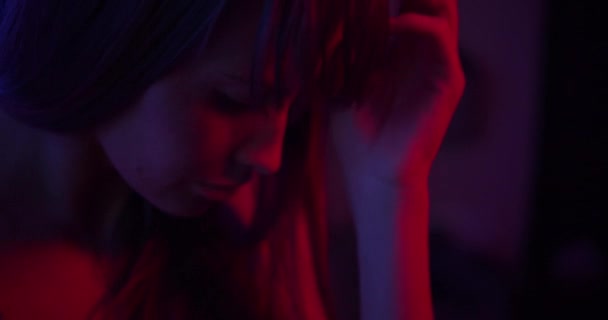 Fashion model girl in red light — Stock video