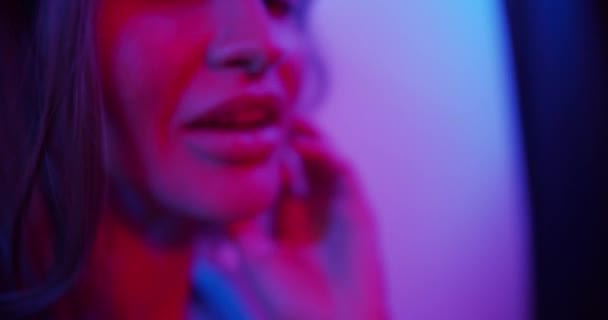 Fashion model girl in neon light — Stockvideo