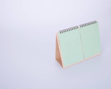 Takvim veya arka planda boş masa takvimi.