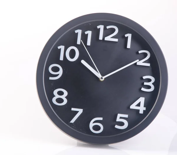 Clock or wall clock on a background. — Stock Photo, Image