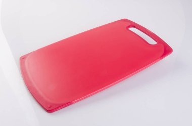 kesme tahtası veya arka plan üzerinde plastik kesme tahtası.