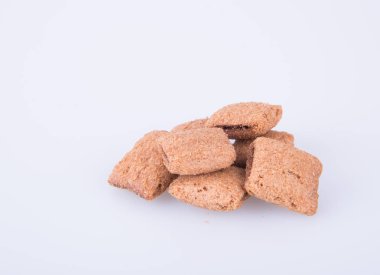 bir arka plan üzerinde krem çikolata çerez ya da bisküvi dolu.