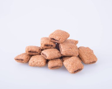 bir arka plan üzerinde krem çikolata çerez ya da bisküvi dolu.