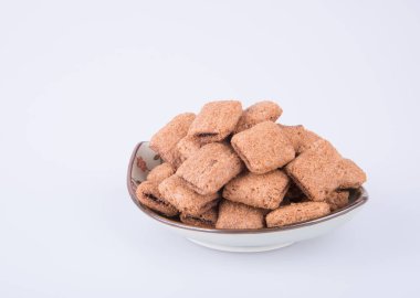 bir arka plan üzerinde krem çikolata çerez ya da bisküvi dolu.