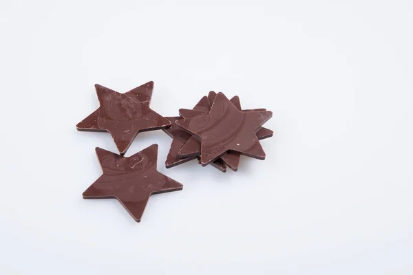 Gwiazda czekolady lub czekolady na tle. — Zdjęcie stockowe