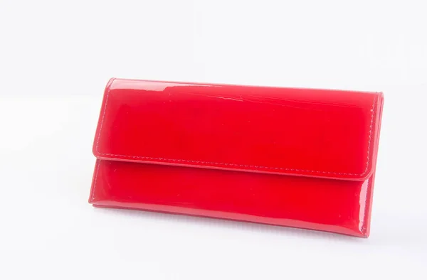 拿皮夹或钱包女人 （红色） 在背景上. — 图库照片