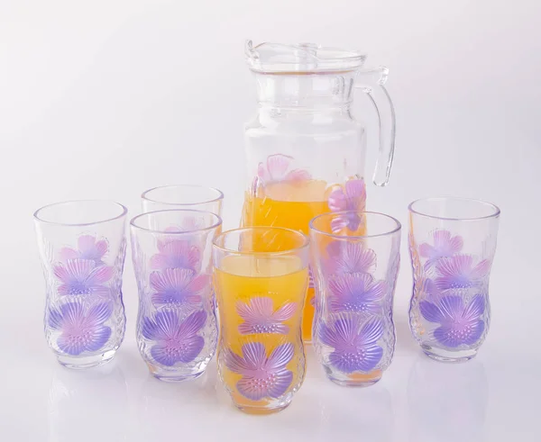 Orange juice in glasses on white background. — Stock Photo, Image