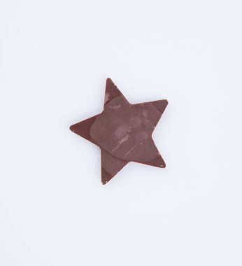 Bir arka plan üzerinde çikolata veya çikolata yıldız.