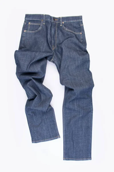 Jeans o jeans blu su uno sfondo . — Foto Stock