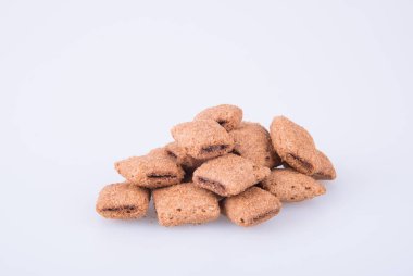 bir arka plan üzerinde krem çikolata çerez ya da bisküvi dolu.