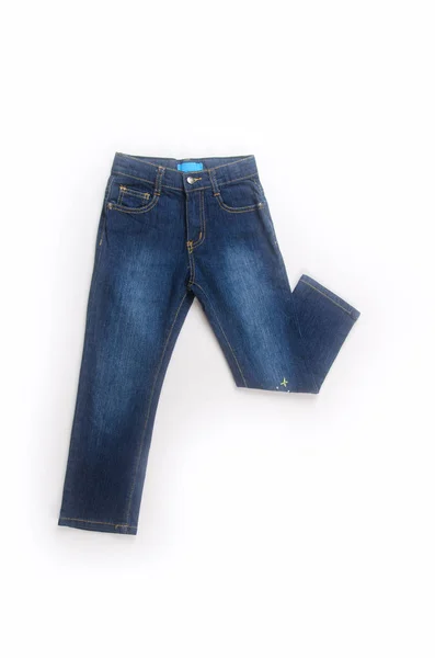 Jeans eller jeans för kid på en bakgrund. — Stockfoto