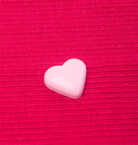 Chocolate en color rosa o chocolate en forma de amor . — Foto de Stock