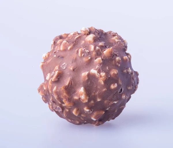 Piłka czekolady lub czekolady bonbon na tle. — Zdjęcie stockowe