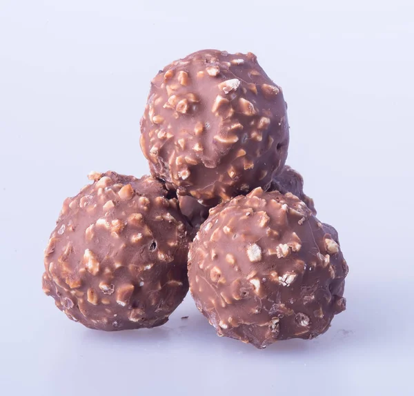 Piłka czekolady lub czekolady bonbon na tle. — Zdjęcie stockowe