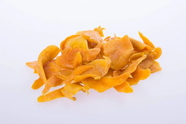 mango dry or dried mango slices on background.