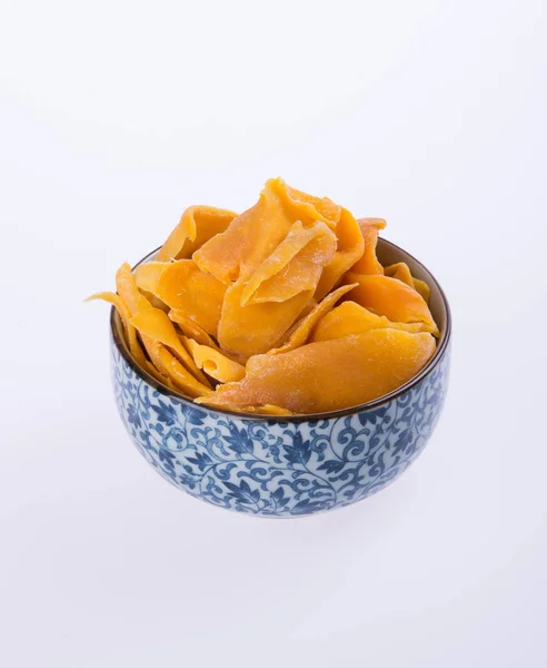 Mango dry in bowl or dried mango slices. — Stock Photo, Image