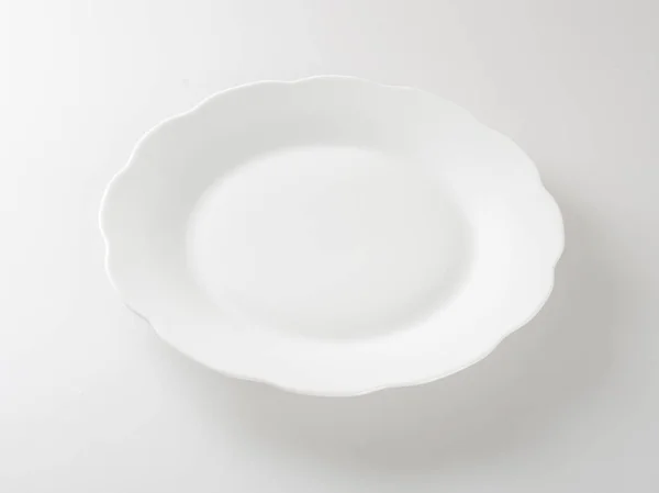 Teller oder leerer Teller auf einem Hintergrund. — Stockfoto