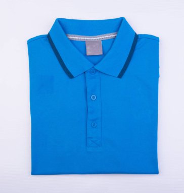 gömlek ya da erkek polo gömlek arka plan üzerinde katlanmış.