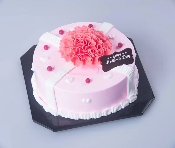 Ciasto lub tort urodzinowy na tle. — Zdjęcie stockowe