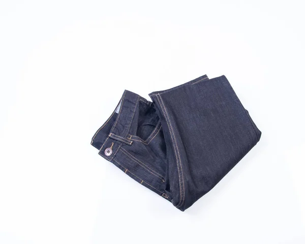 Jeans eller blå jeans på en bakgrund. — Stockfoto