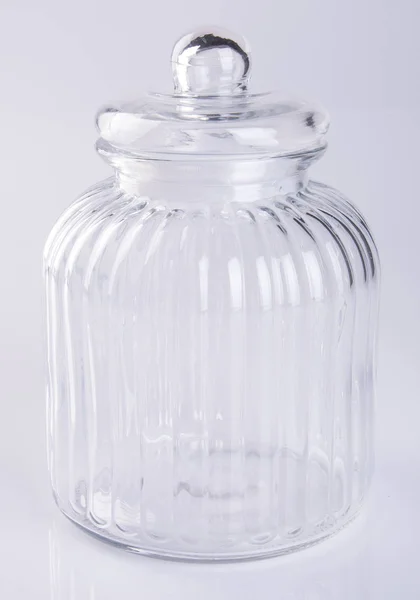 Vidro ou frasco de doces em um fundo . — Fotografia de Stock