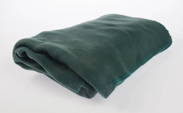 Cobertor ou cobertor quente macio no fundo . — Fotografia de Stock