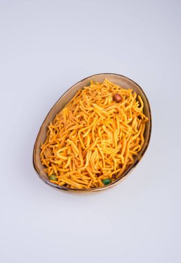 murukku veya geleneksel Hint snack chakli ve chakali backgr üzerinde