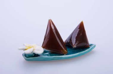 dodol or malaysia traditional candy on the background. clipart
