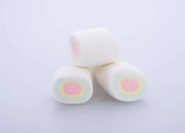 Marshmallows o marshmallows caramelle sullo sfondo . — Foto Stock