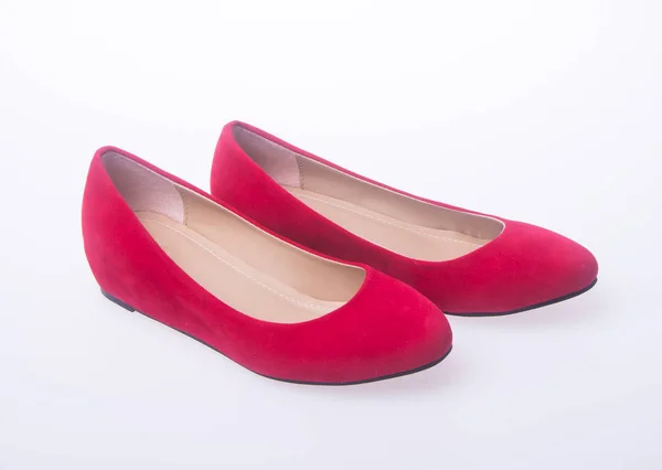 Boty. červené a módní boty žena na pozadí. — Stock fotografie